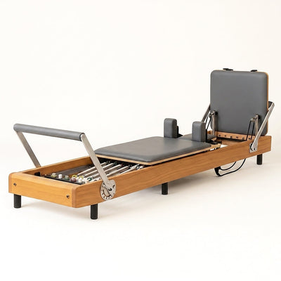 Pilates Reformer Built for Studio Performance, Aircraft-Grade Aluminum, 8-Wheel Carriage, Maple Accents